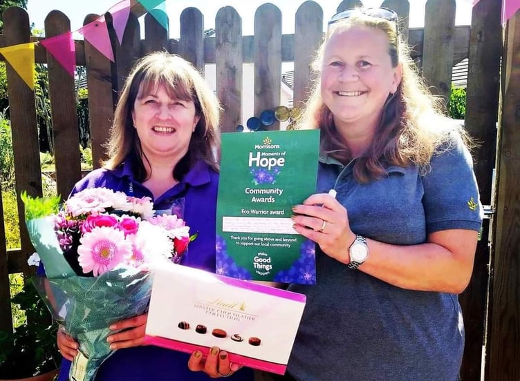 Mandy, right, presenting an Eco Warrier Award to Teresa Rowe.