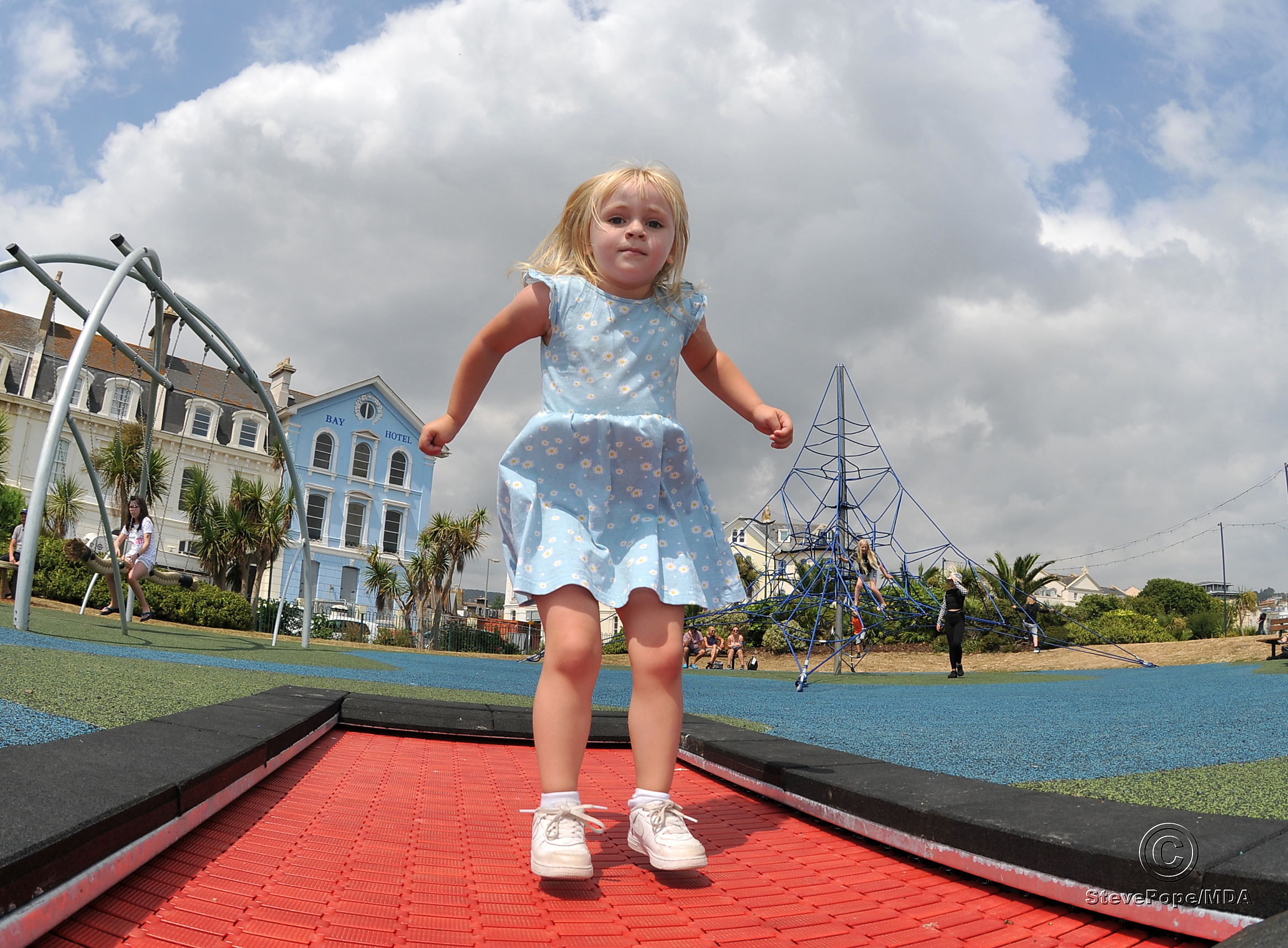 Children's playpark at The Den, Teignmouth, re-opens after refurbishment. Jump to it - three year old Eloise Primrose Clarke from Teignmouth