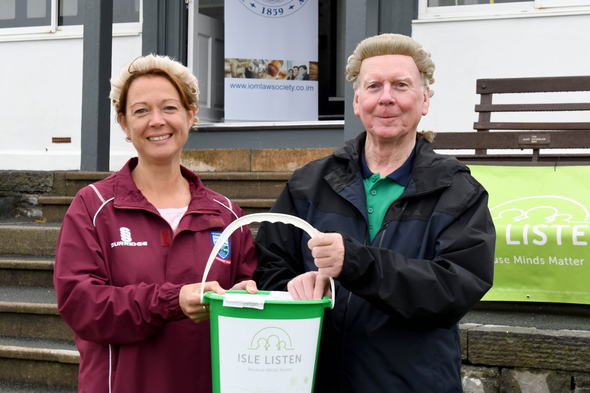 Isle of Man Law Society’s 24 hour ‘wig walk’ at King William’s College in aid of Isle Listen and the society’s own charity People in Need - pictured is Kathryn Clough (society president) and Robert Jelski (longstanding advocate and trustee of People in Need)