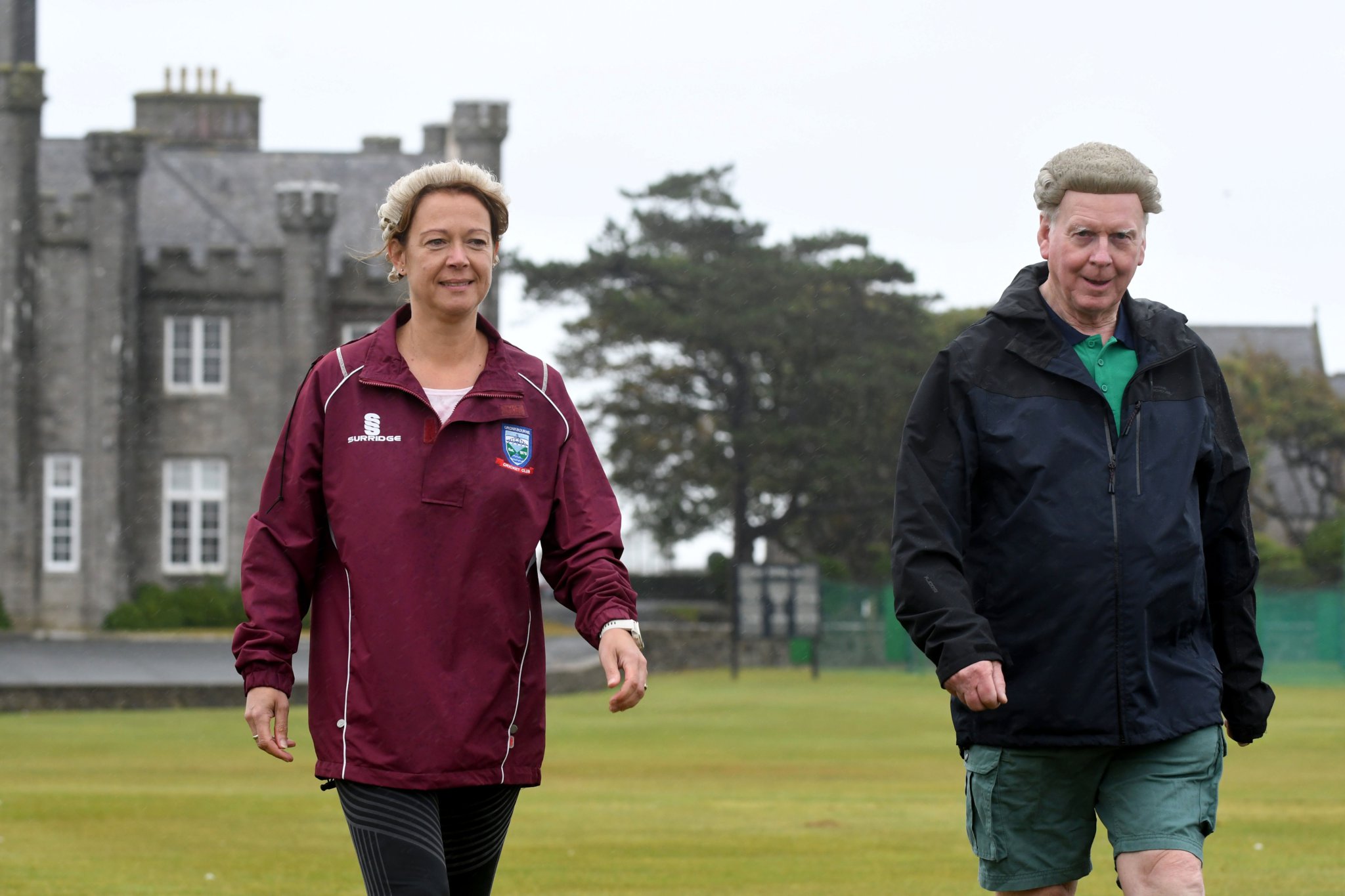 Isle of Man Law Society’s 24 hour ‘wig walk’ at King William’s College in aid of Isle Listen and the society’s own charity People in Need - pictured walking is Kathryn Clough (society president) and Robert Jelski (advocate and trustee of People in Need)