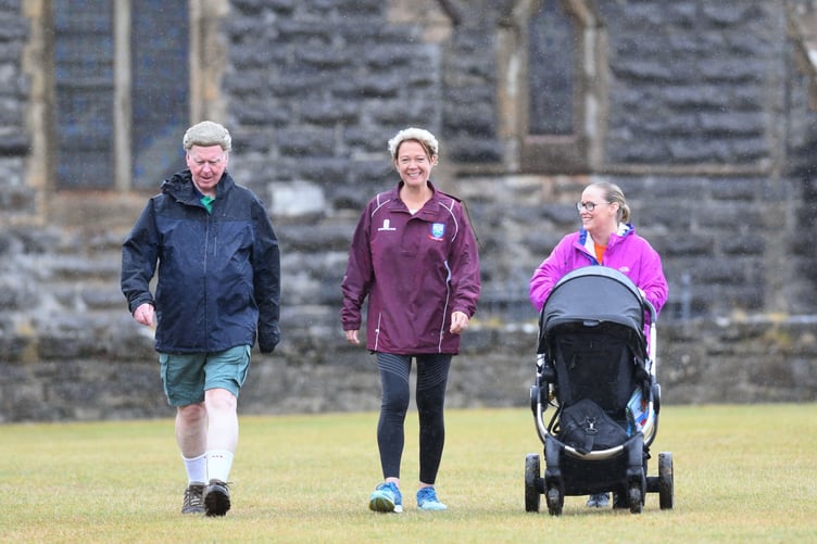 Isle of Man Law Society’s 24 hour ‘wig walk’ at King William’s College in aid of Isle Listen and the society’s own charity People in Need - pictured walking is Kathryn Clough (society president), Robert Jelski (advocate and trustee of People in Need) and Vicki Unsworth (law society vice president) with her son Alexander Taubitz