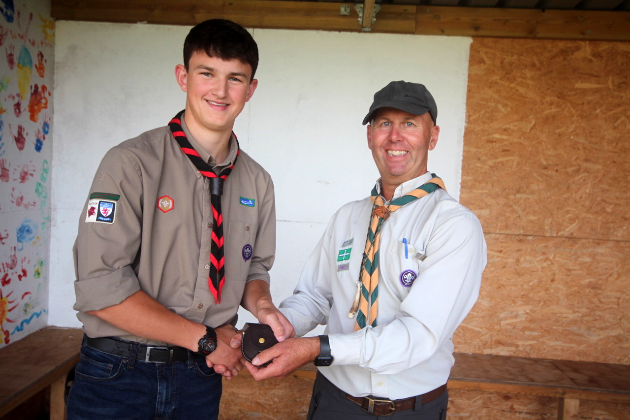 Everyone who received their certificates and badges with George Davey Assistant District Commissioner for Scouts. SR 5560