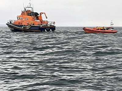 RNLI fundraising eam members were out collecting donations from the crowds watching the water-based demonstration that the volunteer crew put on in aid of Teignmouth Regatta Week.
Picture: RNLI
(Amy Furlong, Aug 2022)