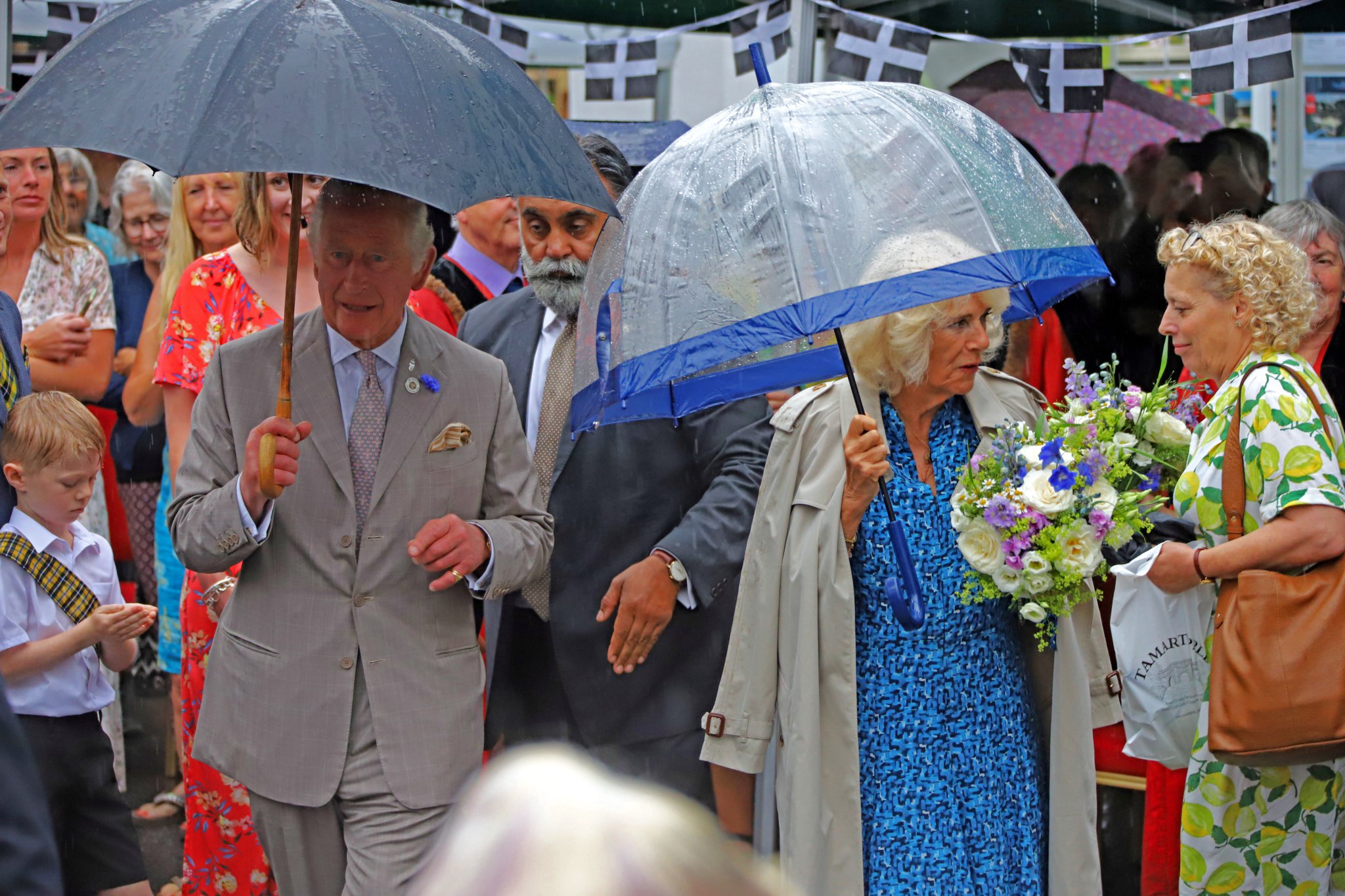 ABOVE: Camilla, Duchess of Cornwall
RIGHT: Their Royal Highnesses meeting Launceston Town Crier Rob Tremain.
Below: Prince Charles chatting with some of the youngsters of the town
Pictures: Mark Theisinger