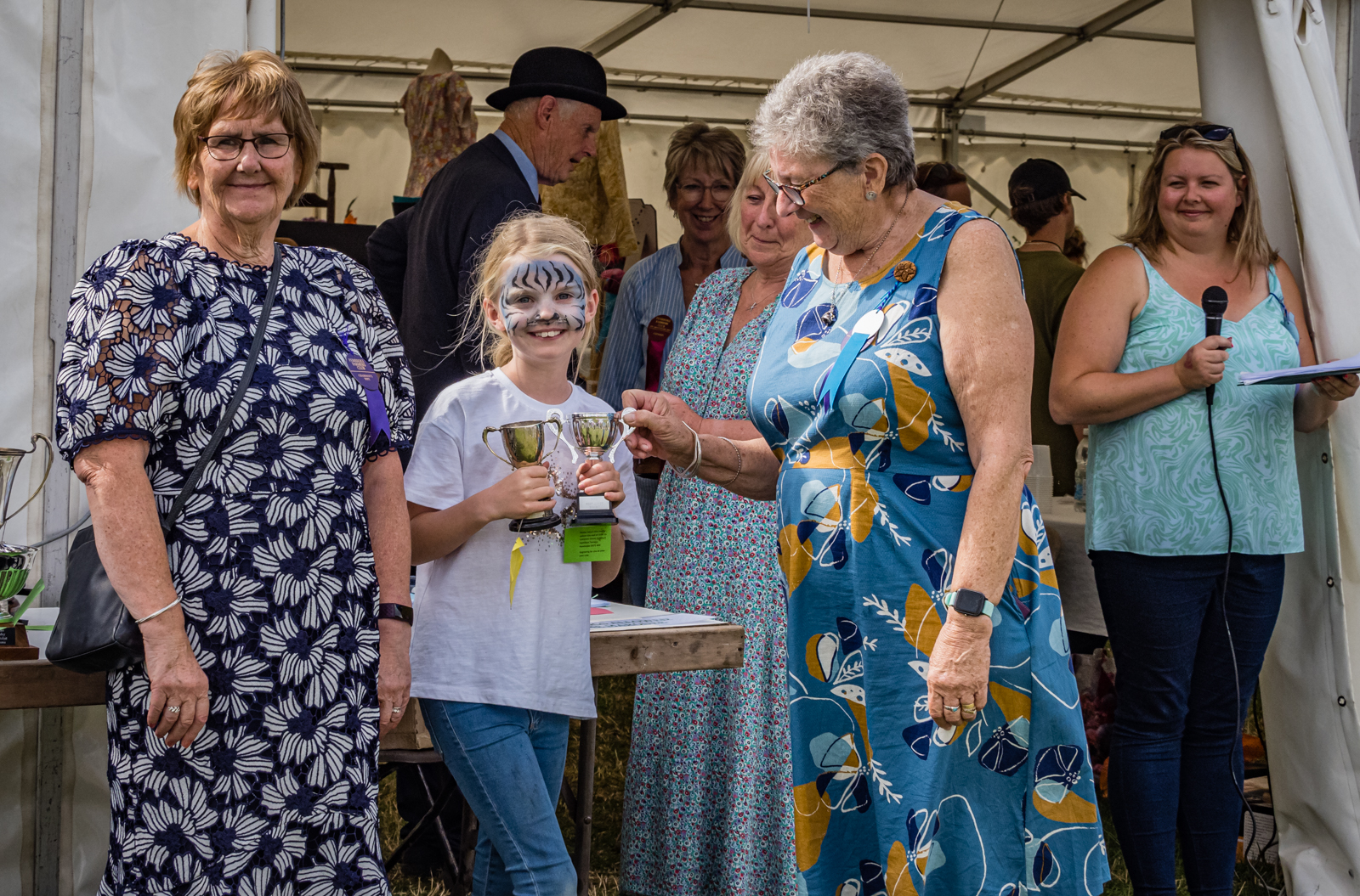 Layla Mcgilloway receiving trophies for the Childrens Section