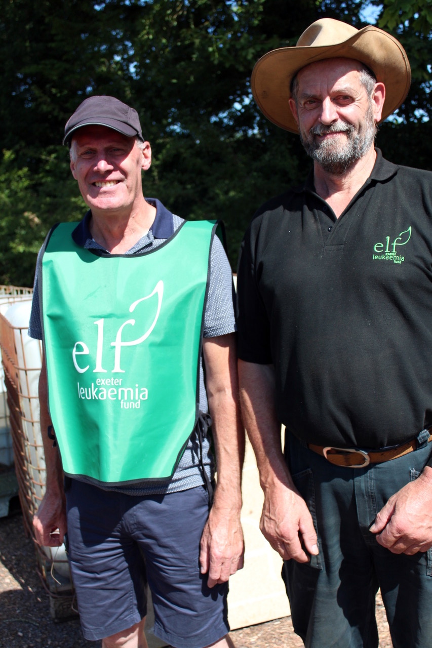 Many of the plants for sale came from the garden of Wilson Mitchell here with Paul Evans (left). SR 5772