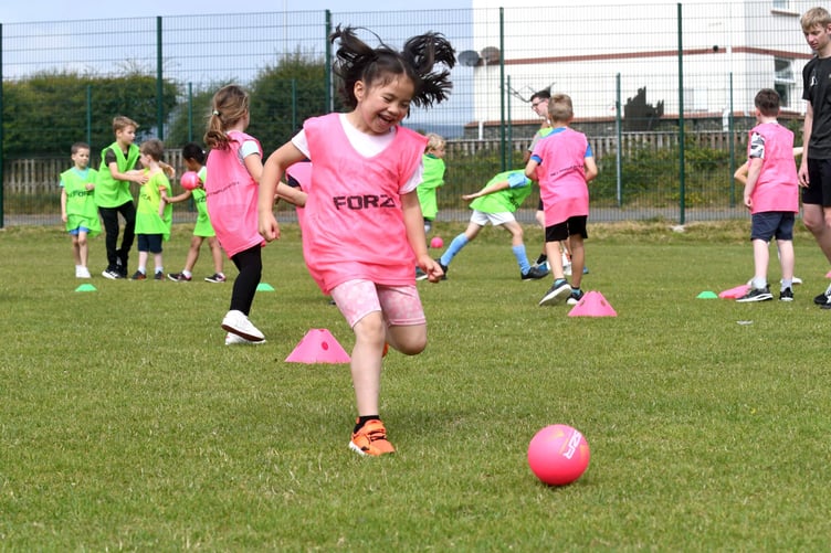 All smiles from the children as they enjoy playing at the Futures by Active Souls Summer Camp Photo: Dave Kneale