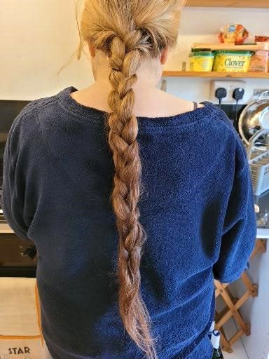 Sarah Jane Williams has shaved off her waist-length hair, as seen in before and after photos, right