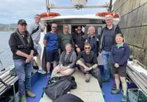 Local divers take German man out to Second World War wreck site for a memorial