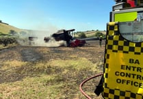 FIRE UPDATE: pictures of combine harvester blaze