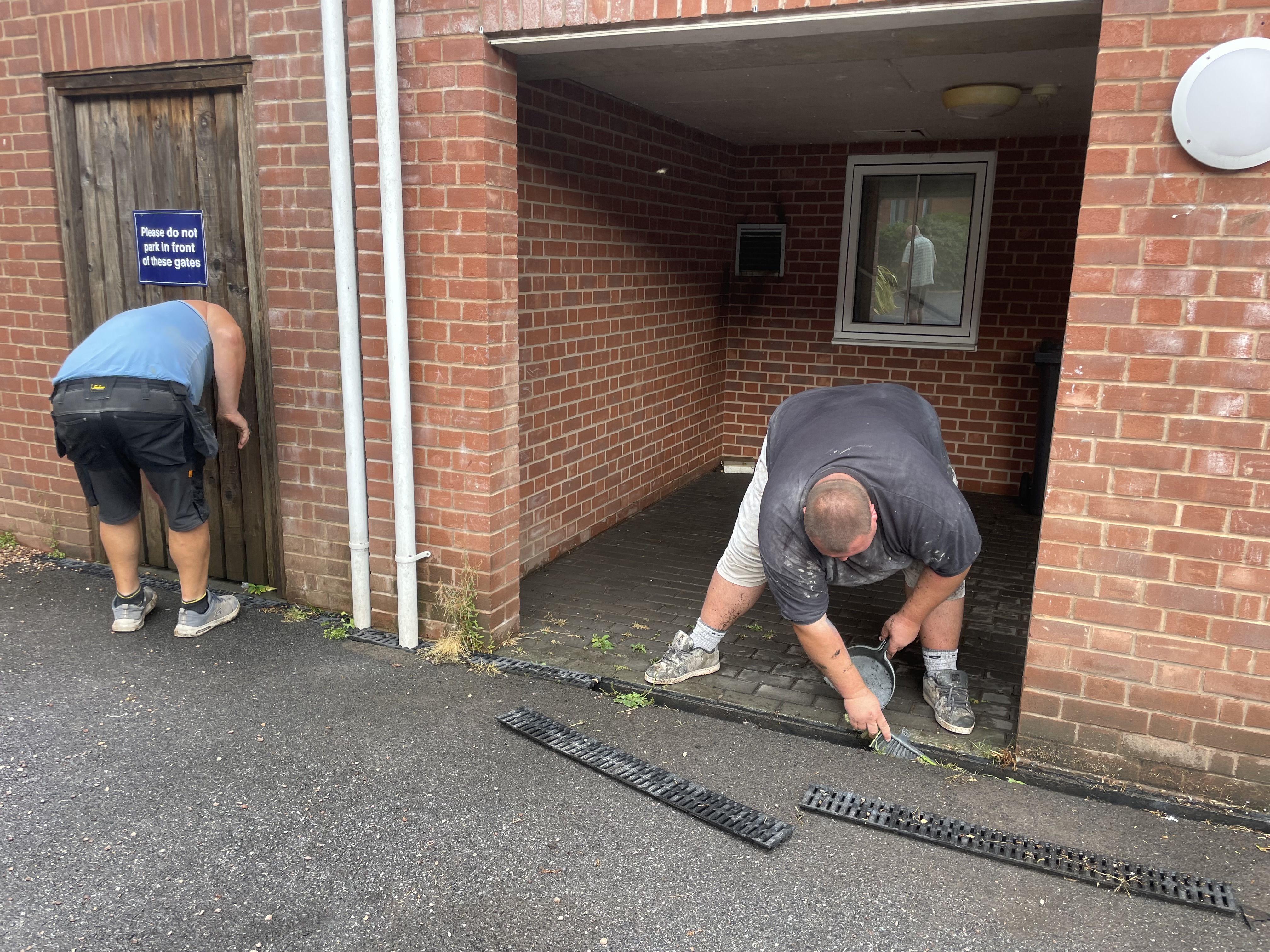 Moping up at Market Square House in Crediton. AQ 3396