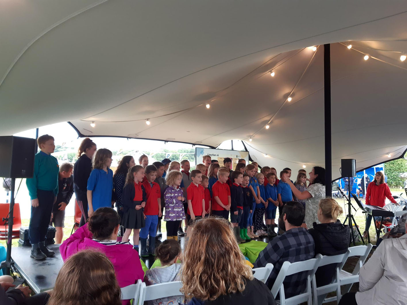 Left: Bala author Clare Mackintosh travelled to the Maes to launch her latest book, The Last Party. Right: Dafydd Iwan, former county councillor for Dwyfor, Gwynedd, and president of Plaid Cymru, told the Cambrian News he was there to promote Plaid’s ‘friends’ to those who are thinking of becoming members but don’t feel ready to commit to that just yet