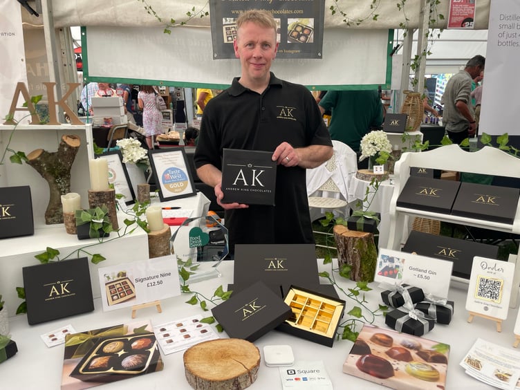 It was difficult for Andrew King Chocolates of North Tawton to keep his hand-made chocolates from melting on the very hot Okehampton Show day. AQ 3097