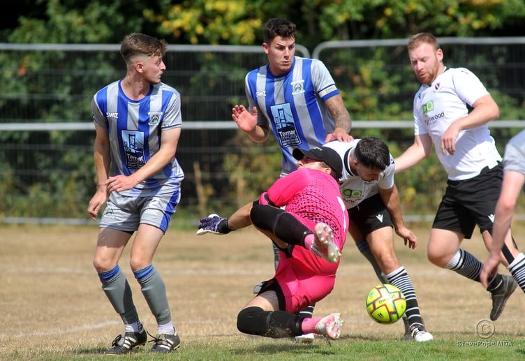 Action from the Peninsula Premier East clash between Teignmouth and Holsworthy on Saturday.