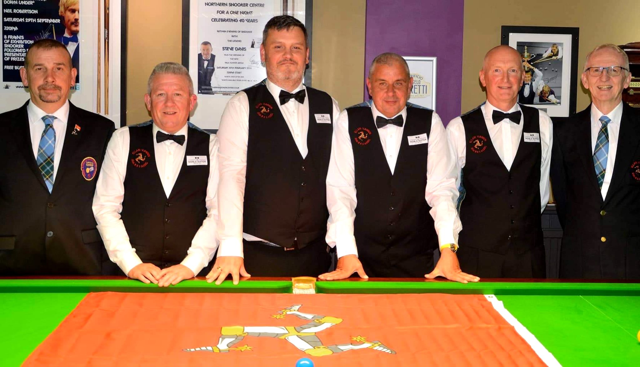 (Left to right) Referee Dave Kelly with Isle of Man Masters players Paul Smyth, Peter Crellin, Chris Dagnall and Mike Crook, along with team manager Ken Kinrade on the far right