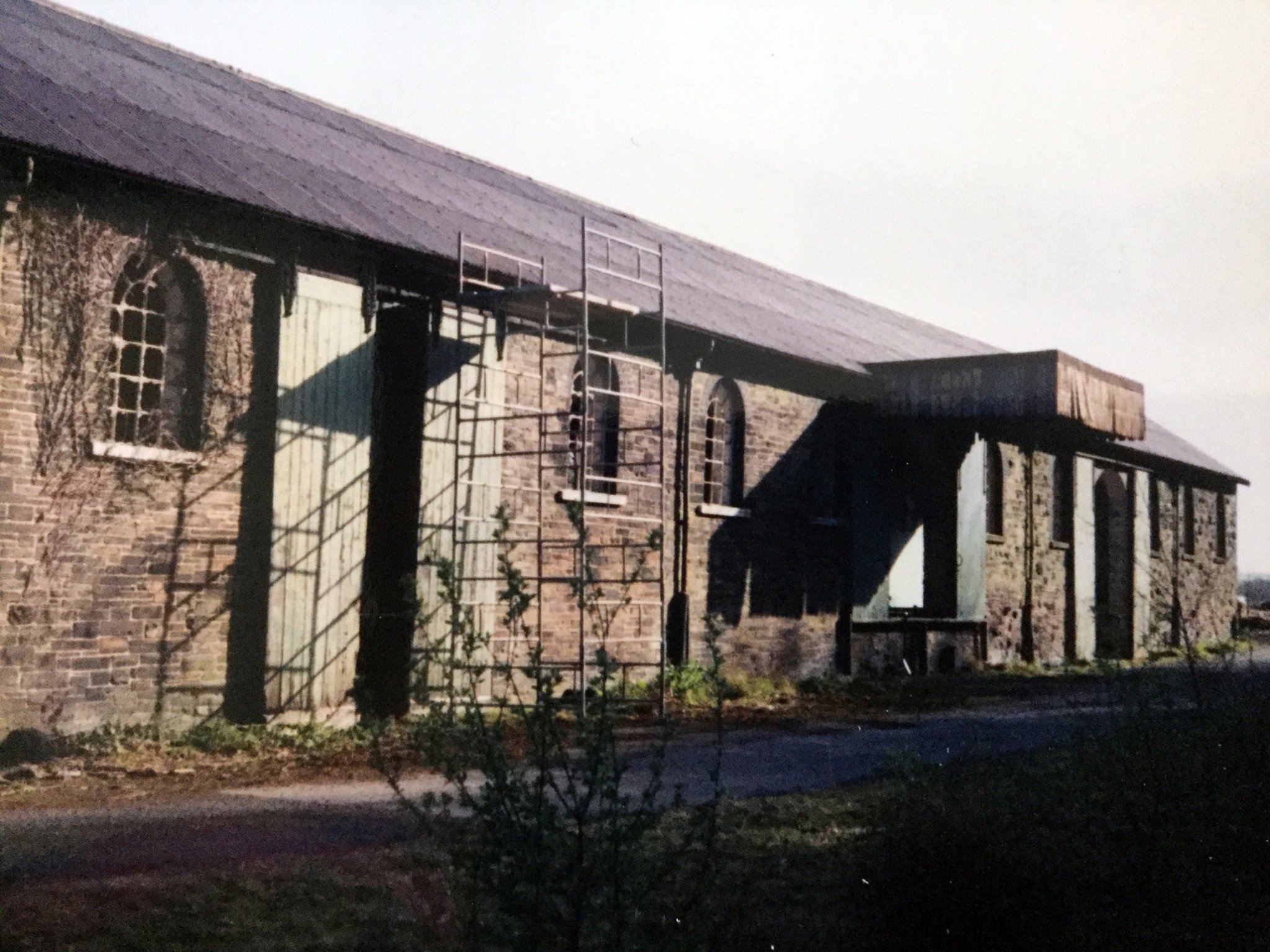 The goods shed at Okehampton beside railway station back in late 1990s before work to convert it into a youth hostel by John Elson