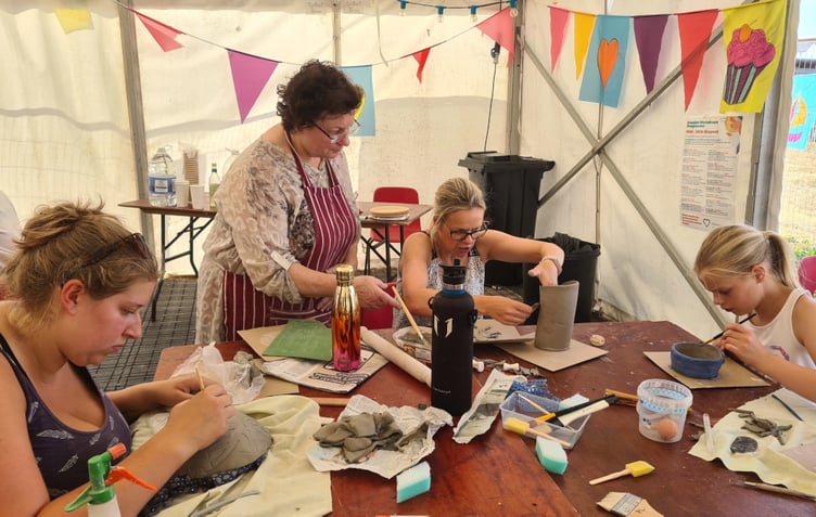 Steph Wentworth with the pottery group.