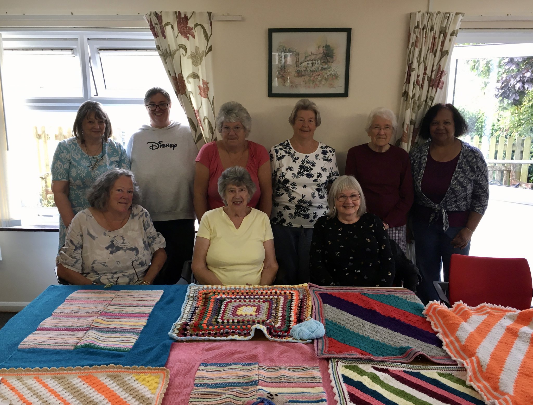 Callington knitting group. Right to Left: Aileen, Helen, Alison, Val, Barbara, Muriel, Jae, Shirley and Josee.