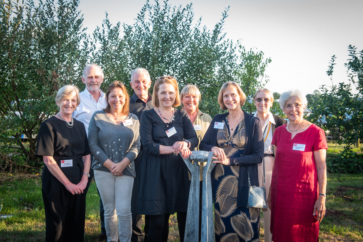 The committee of volunteers who run Art in Penallt with outgoing curator Ann Bradley, centre right and her replacement, Andrea Davis, centre left