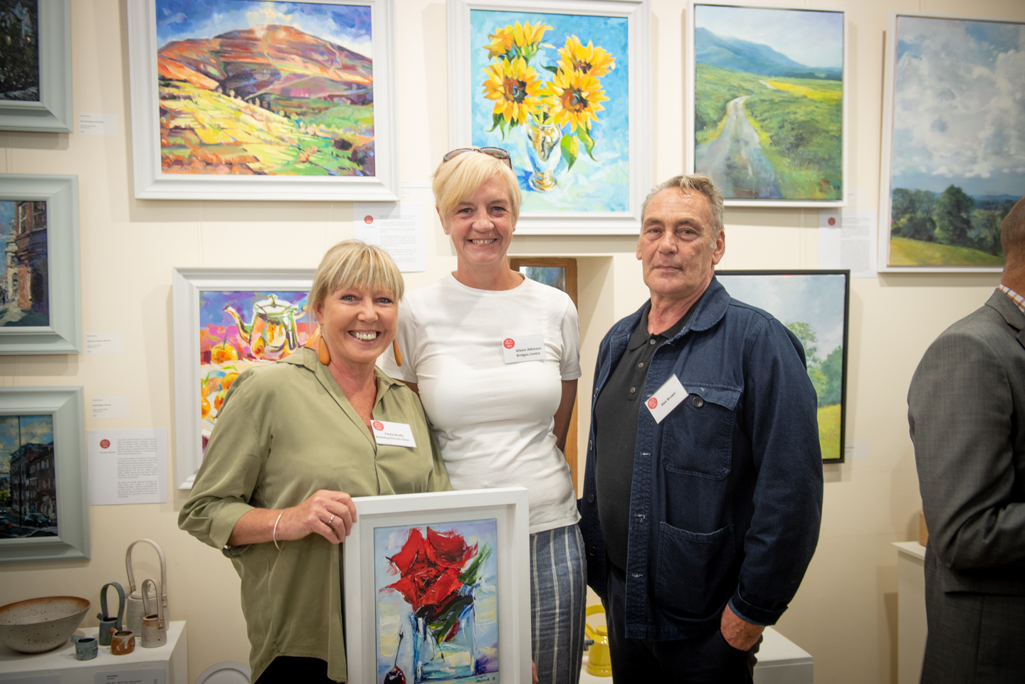 The committee of volunteers who run Art in Penallt with outgoing curator Ann Bradley, centre right and her replacement, Andrea Davis, centre left