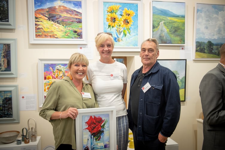 The committee of volunteers who run Art in Penallt with outgoing curator Ann Bradley, centre right and her replacement, Andrea Davis, centre left