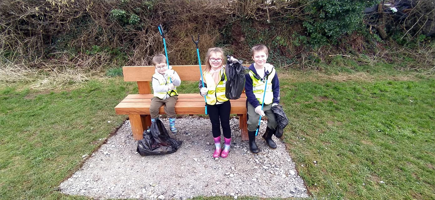 YOUNGSTERS doing their bit to keep their local park tidy in Liskeard