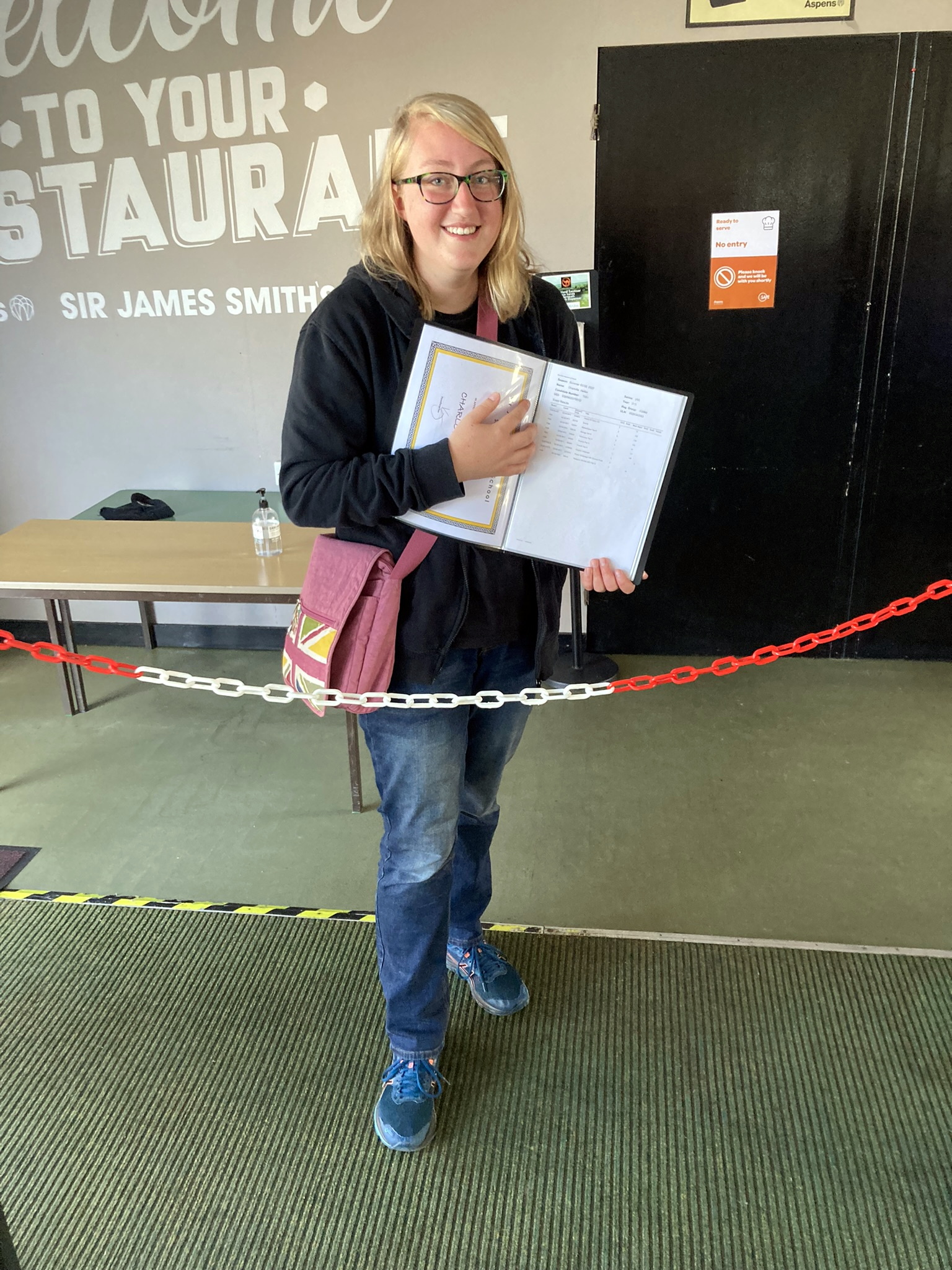 A student collecting their GCSE results at Sir James Smith's School, Camelford