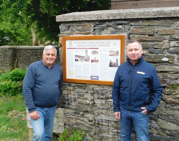 Phil Matthew, the author of board eight and a trustee of Foxdale Heritage, and Peter Bettridge of Bettridge Motors, a sponsor of the project