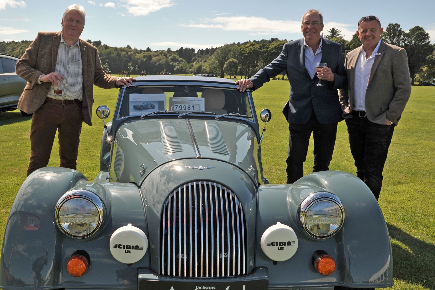 BITA guests with classic car