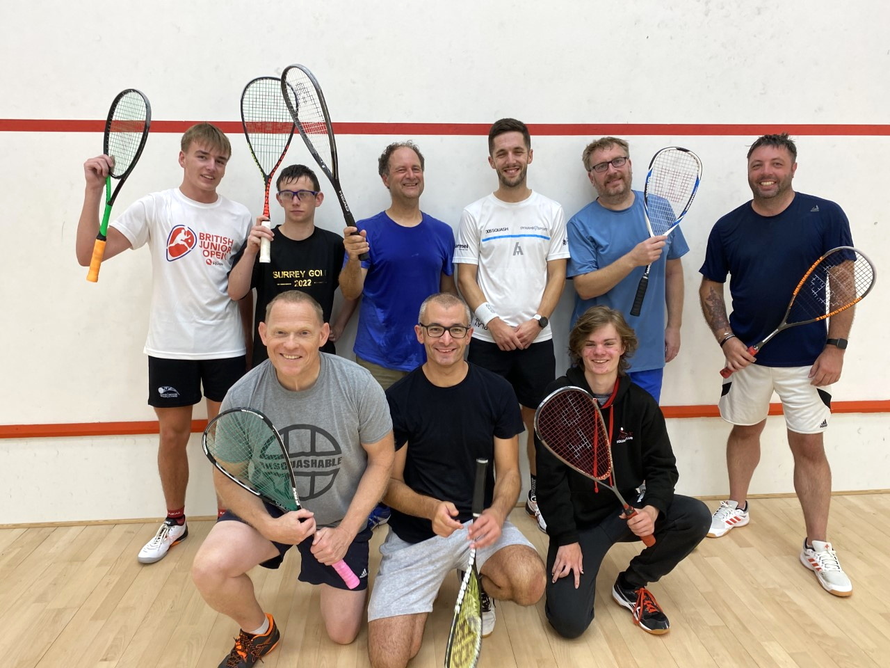 Ben Coleman (back row, third from right) with members of Tavistock Squash Club. INSET: Jane and Wendy Savage.