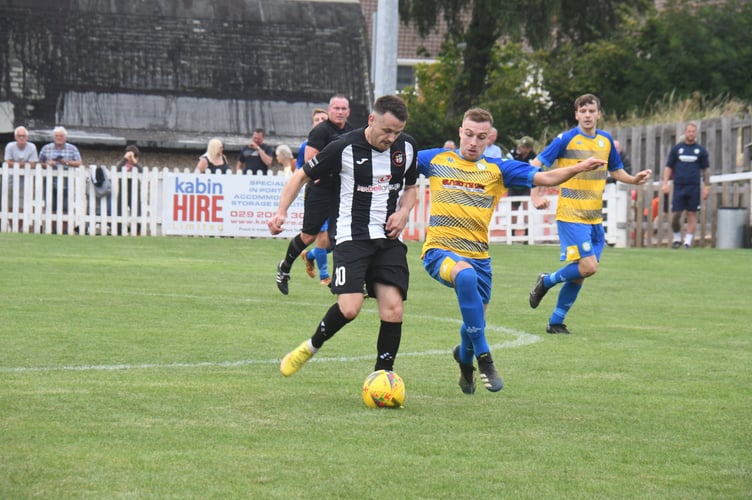 Ben Brooks scored twice for Cinderford Town in their FA Cup game against Laverstock and Ford