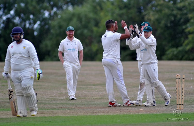 Photo: Steve Pope MDA030922E_SP001 Tolchards Devon Cricket League C Division (West). Teignmouth and Shaldon versus Yelverton Bohemians. Yelverton's Jonathan Malan falls to the bowling of Ruben Minnaar