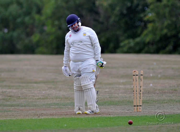 Photo: Steve Pope MDA030922E_SP003 Tolchards Devon Cricket League C Division (West). Teignmouth and Shaldon versus Yelverton Bohemians.  Yelverton's Jonathan Malan falls to the bowling of Ruben Minnaar