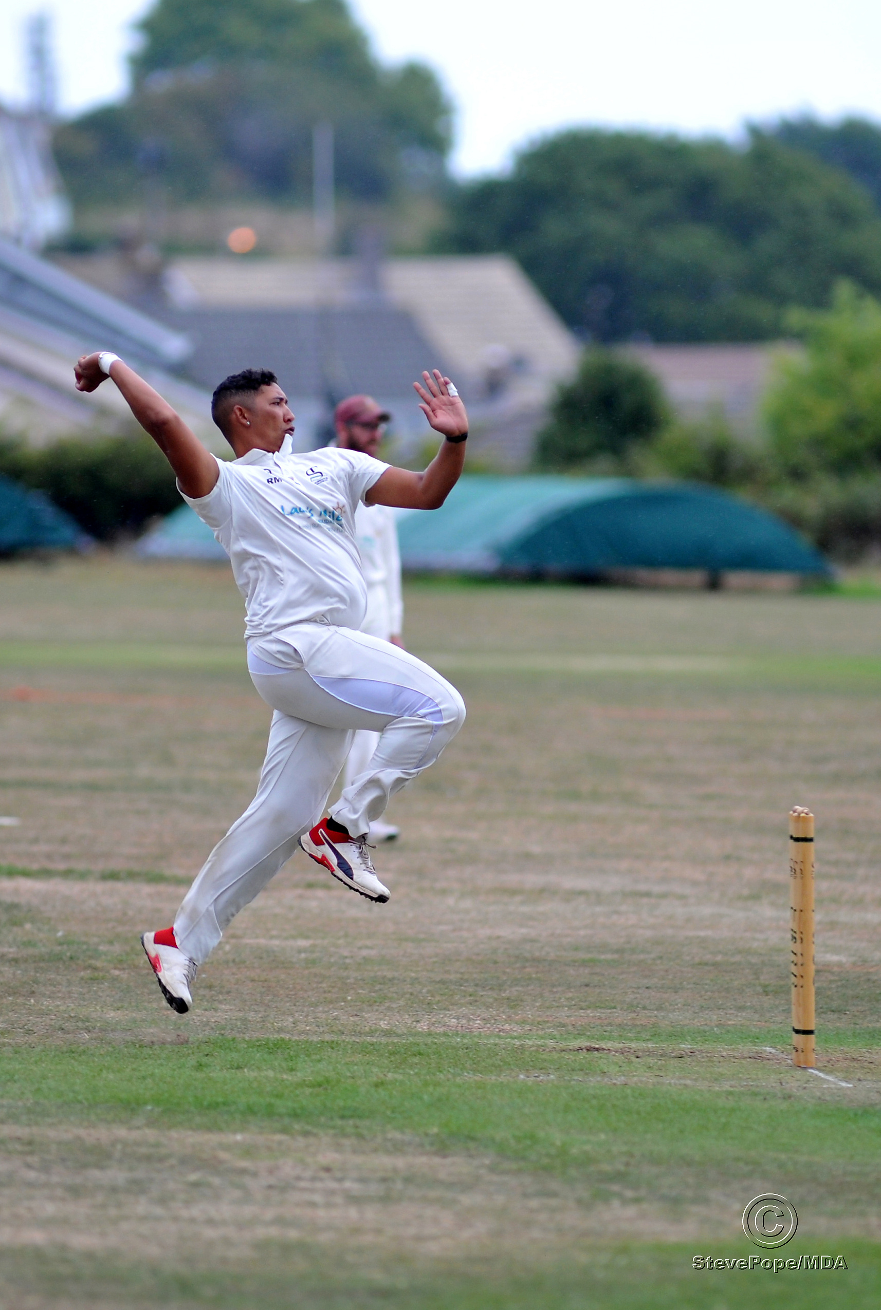 Photo: Steve Pope MDA030922E_SP005 Tolchards Devon Cricket League C Division (West). Teignmouth and Shaldon versus Yelverton Bohemians.  T&S's Ruben Minnaar in full bowling flow