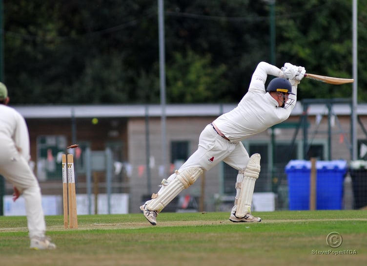 Photo: Steve Pope MDA030922G_SP008 Tolchards Devon Cricket League Premier Division. Bovey Tracey versus Paignton. Paignton's Harry Ward loses his wicket courtesy of Seb Ansley Notes