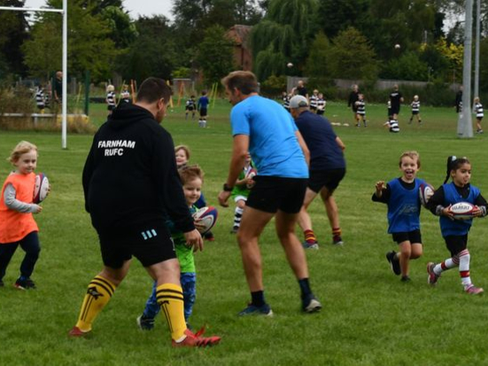 Happiness is an odd-shaped ball as proven by these under-five players at their first-ever training session