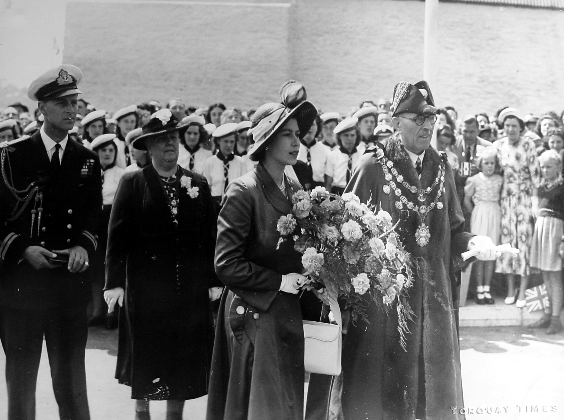Princess Elizabeth, accompanied by Prince Philip, visit Dartmouth to open College Way on 24 June 1949.