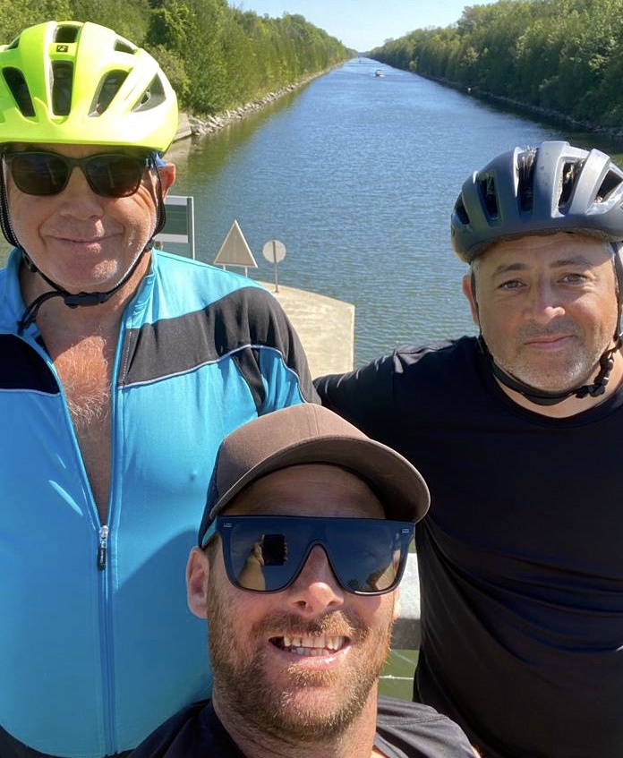 ABOVE: Rune Johnstone with his family, Dad Russell, Mum Sophia and sister Aysa.
LEFT: The three cyclists who completed a gruelling 1000 kilometer ride around Lake Ontario to raise money for extra medical help for two-year-old lad Rune Johnstone from Bishopsteignton. They are, from left, Dave Rice, Russell Johnstone, Marcus Weston.