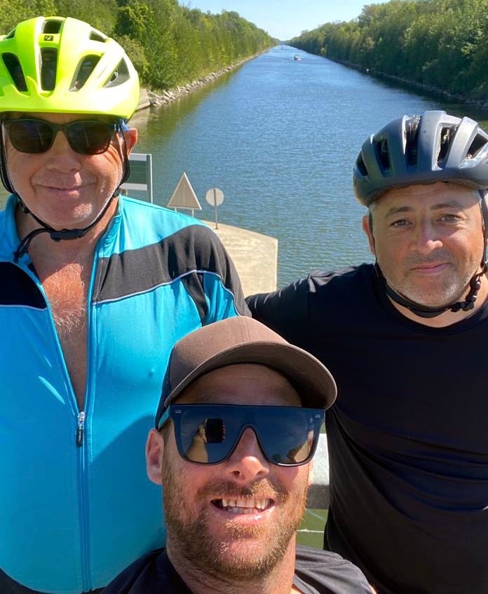 ABOVE: Rune Johnstone with his family, Dad Russell, Mum Sophia and sister Aysa.
LEFT: The three cyclists who completed a gruelling 1000 kilometer ride around Lake Ontario to raise money for extra medical help for two-year-old lad Rune Johnstone from Bishopsteignton. They are, from left, Dave Rice, Russell Johnstone, Marcus Weston.