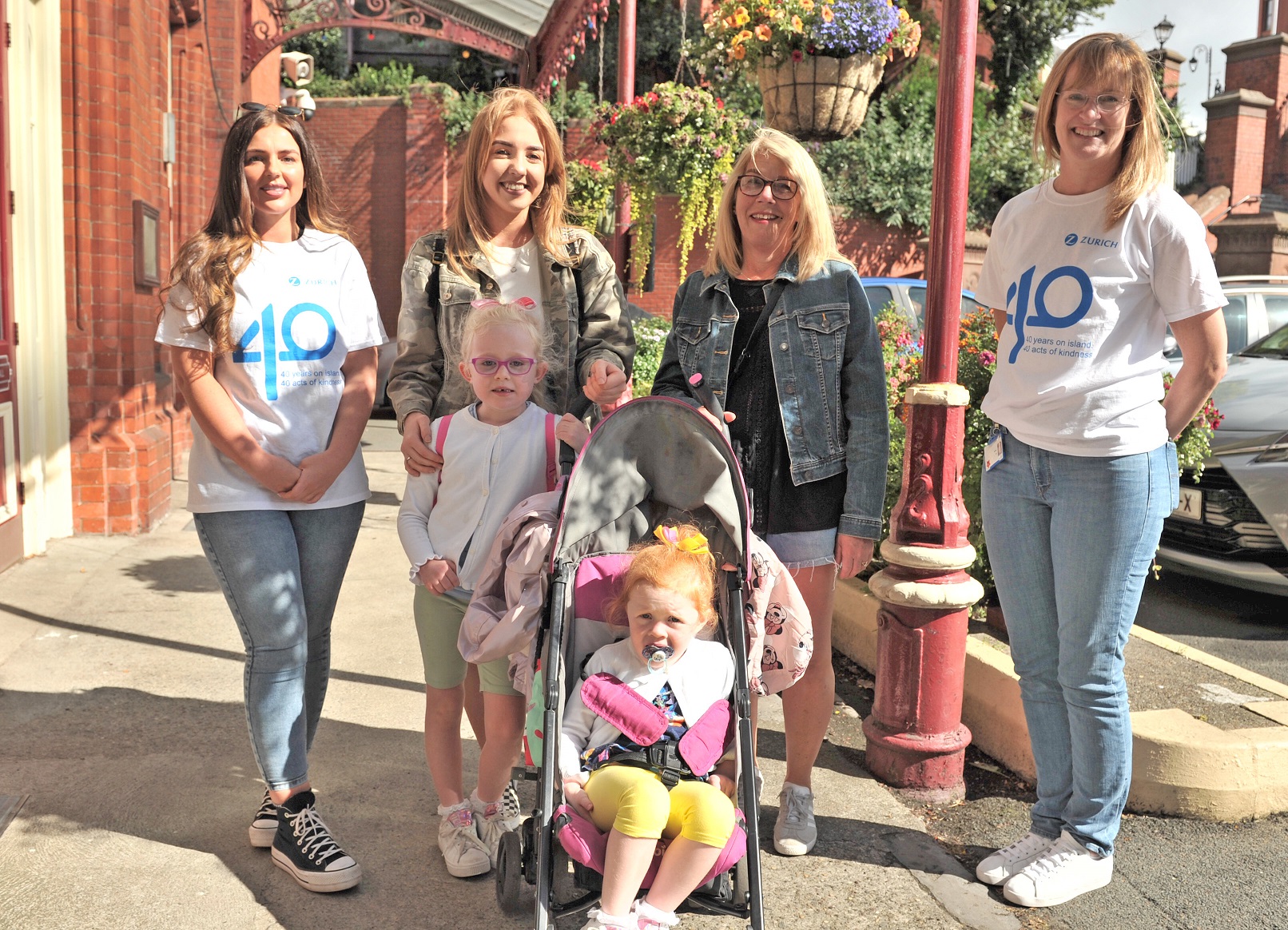 Zurich employees Jade Morgan (far left) and Liz Harris (far right). With them are Finnuala McNulty, Mae Earwaker, Kay Earwaker and Mary McNulty