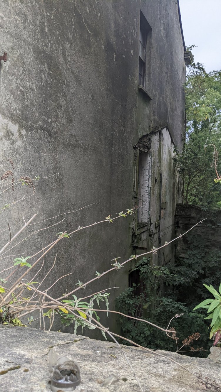 The side of the buildings looks in need of repairing