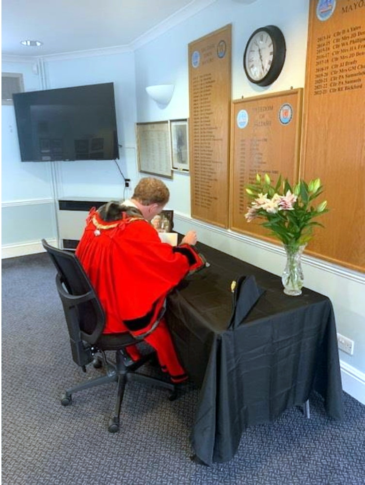 Flowers were laid and the book of condolence signed