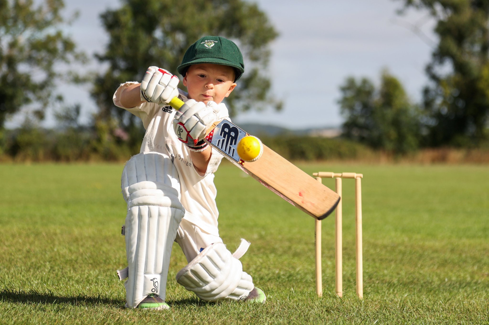 Meet the three-year-old cricket sensation - who started bowling before he could walk and wears a size tiny in his adorable cricket gear. Korey Adams has playing the popular sport since he was just 12 months old and hopes to travel around the world with the England team - when he can finally fit into his cricket kit. St Briavels, Gloucestershire. See SWNS story SWSMcricket; Meet the cricket sensation aged THREE - who started bowling and batting before he could walk. Korey Adams has playing been playing the game since he was 12 months old and wants to represent England. The little superstar is not even old enough to attend nursery but has already turned out for an an under 11s game. And during that clash he took two wickets for just three runs - and was 12 not out. The pint-sized all rounder regularly practices bowling and batting alongside his older peers. He does not yet play for a regular team as he is too young - but joins in during practice games at his dad's club St Briavels. Korey has played one match fo