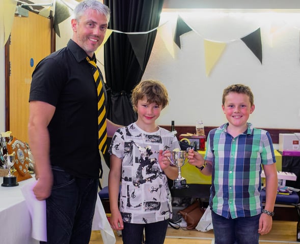 Clockwise from top left, Up-and-coming junior boys Jamie and Henry with head coach James Lake , ribbon awards for the club’s younger members, and new club captains, JJ Lake and Elsie Maguire, with head coach James Lake