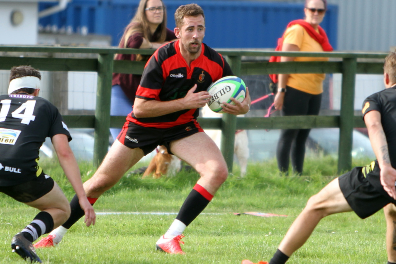 ABOVE: Chris Watts crashes over for a try. ABOVE RIGHT: Liam Mills with a strong carry. BELOW: Ollie Tape with a strong run. BELOW LEFT: Twos captain James Lovering with some fancy footwork.