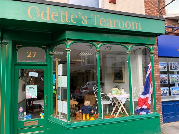 Tributes in the windo of Odette’s Tearoom in Wellington
