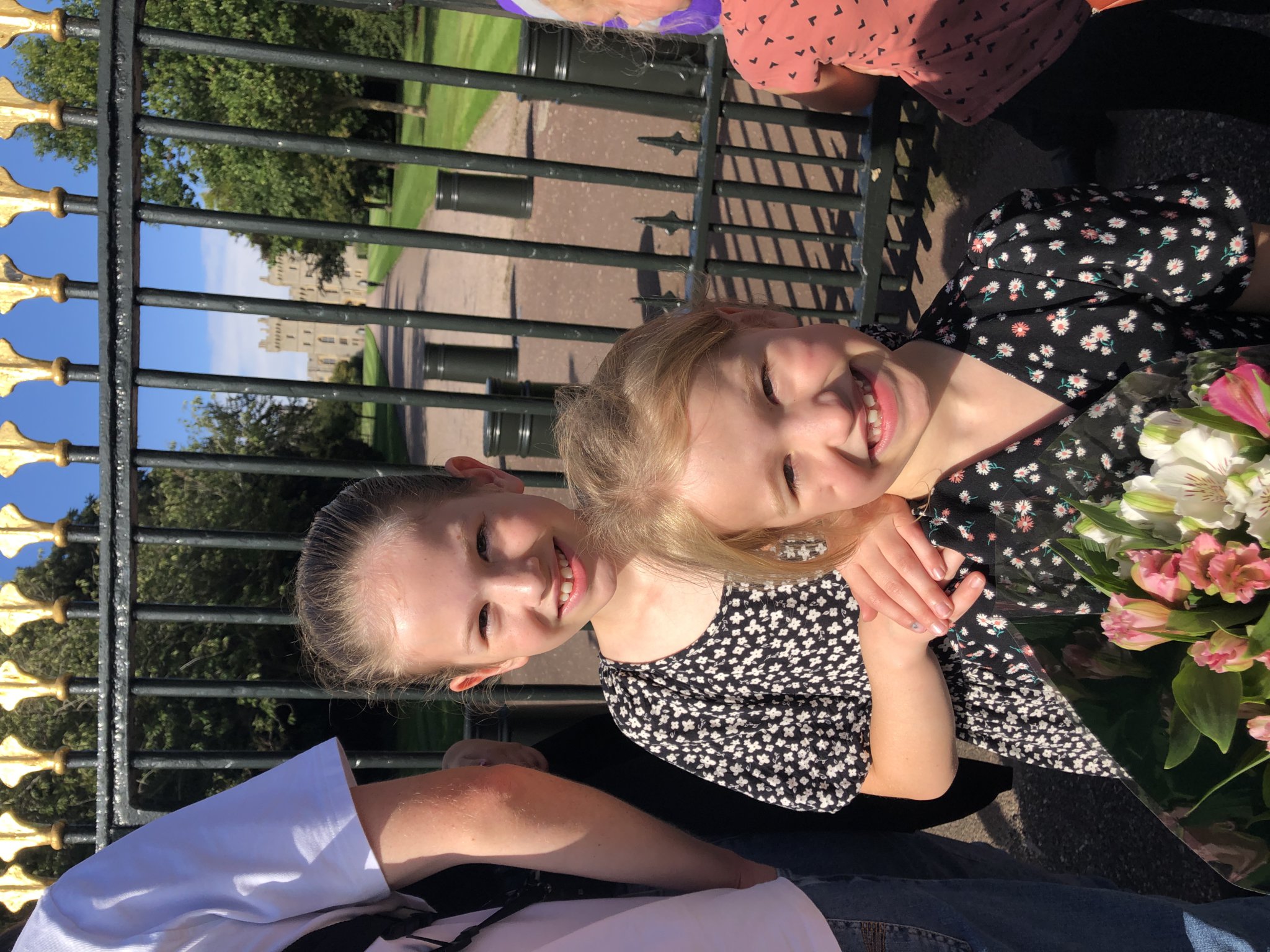 Isabelle and Sophie Clarke talk to Prince Harry in Windsor