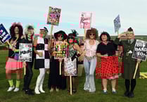 Black armbands worn during carnival as mark of respect