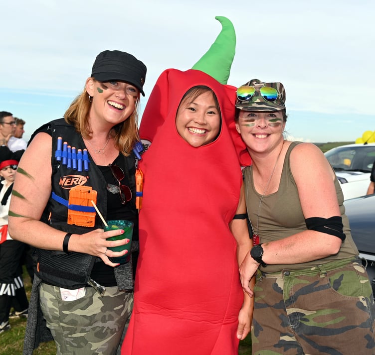 Getting in the carnival spirir are Sam, Tamsin and Gemma
