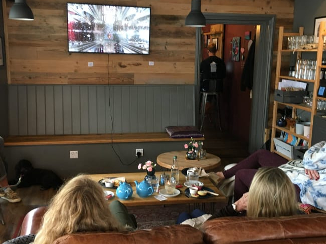 The TV at the Lion’s Den Cafe in Wey Hill showed the funeral